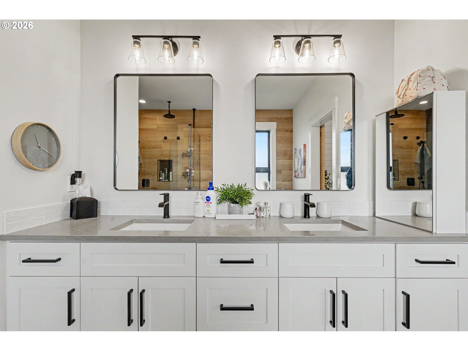 835 Reagan Street Mount Angel, OR 97362 - Photo 27 of 45 a bathroom with double vanity sink and a mirror