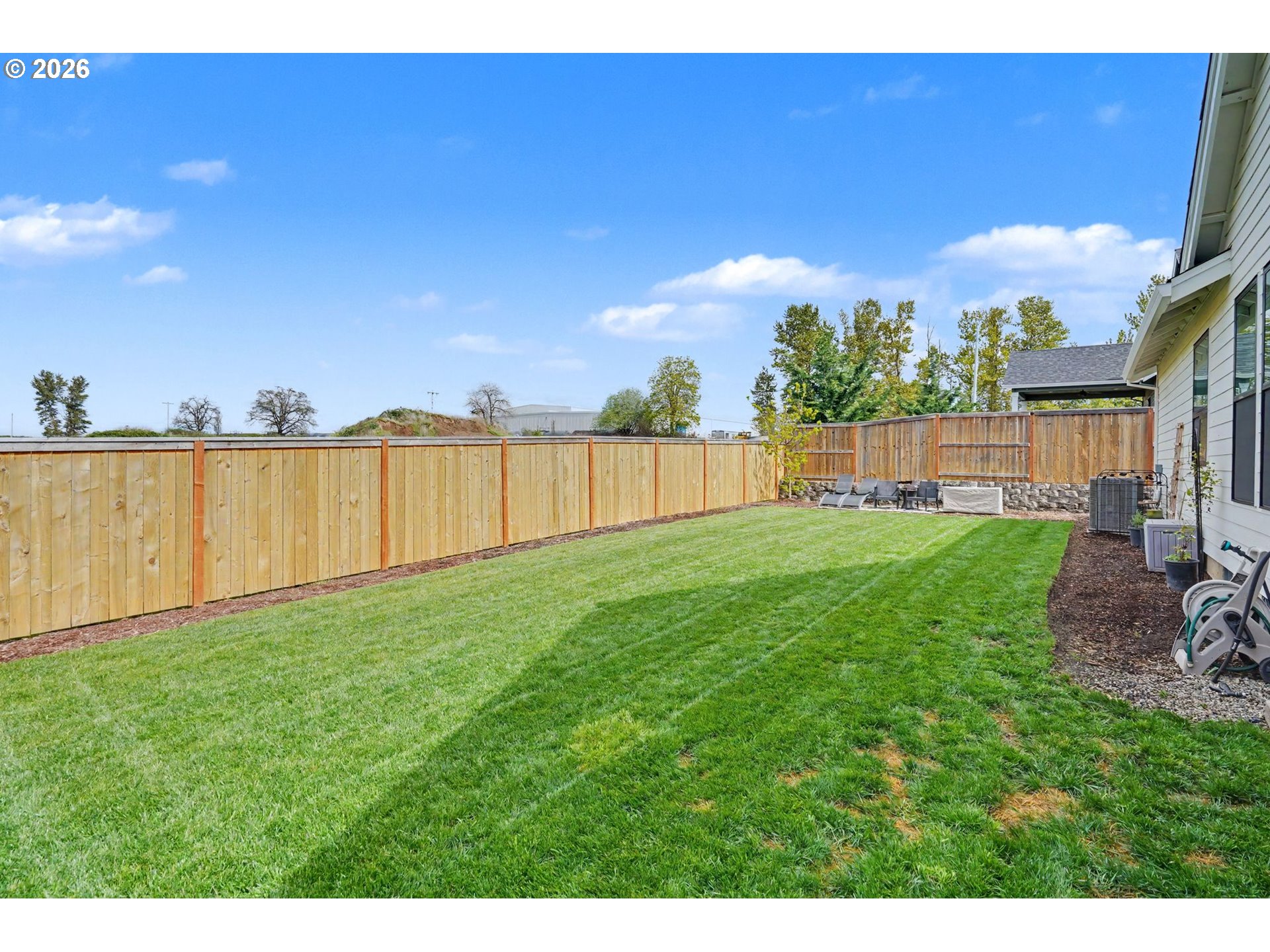 835 Reagan Street Mount Angel, OR 97362 - Photo 45 of 45 a view of a backyard with a garden