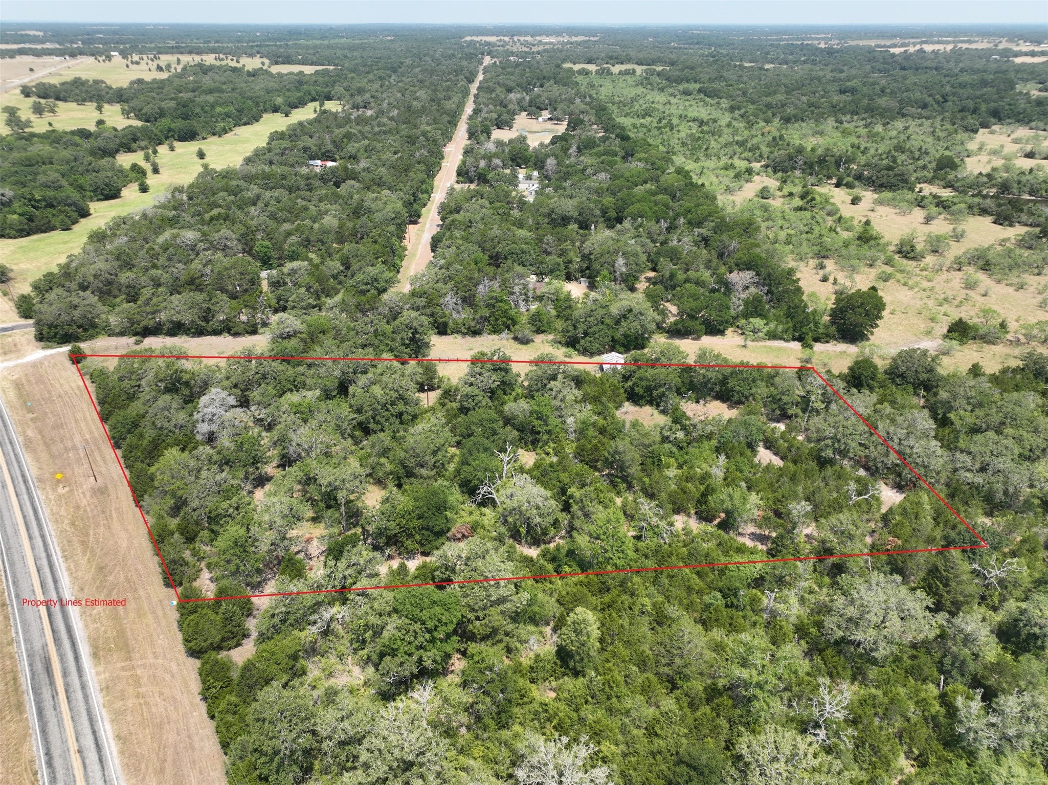 0 Fm 60 Somerville, TX 77879 - Photo 3 of 22 an aerial view of residential houses with outdoor space and trees