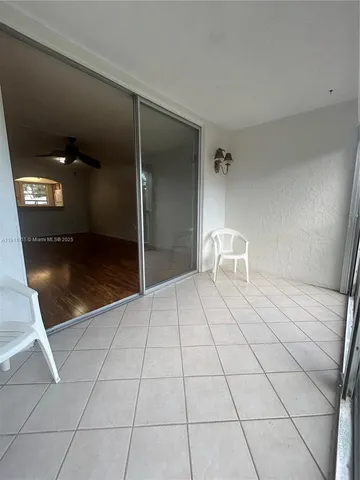 a view of a livingroom with furniture