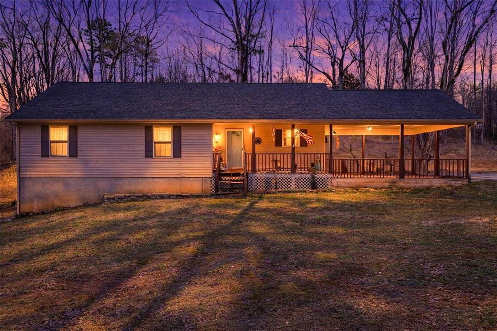 6124 Clyde Conner Road Murrayville, GA 30564 - Photo 2 of 48 a view of a yard