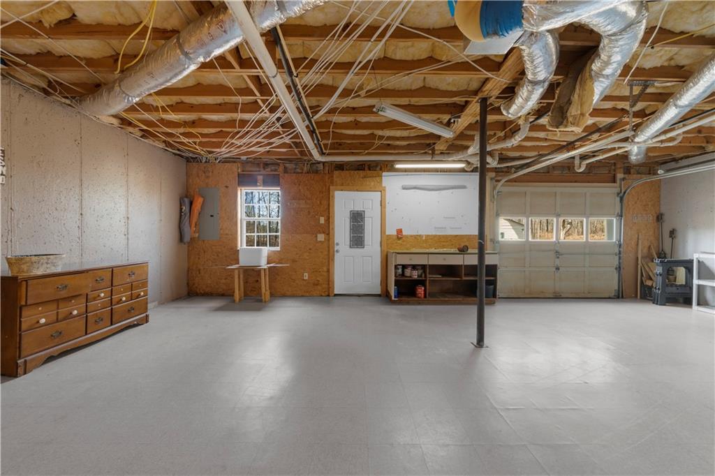 6124 Clyde Conner Road Murrayville, GA 30564 - Photo 24 of 48 a view of a livingroom with furniture and a ceiling fan