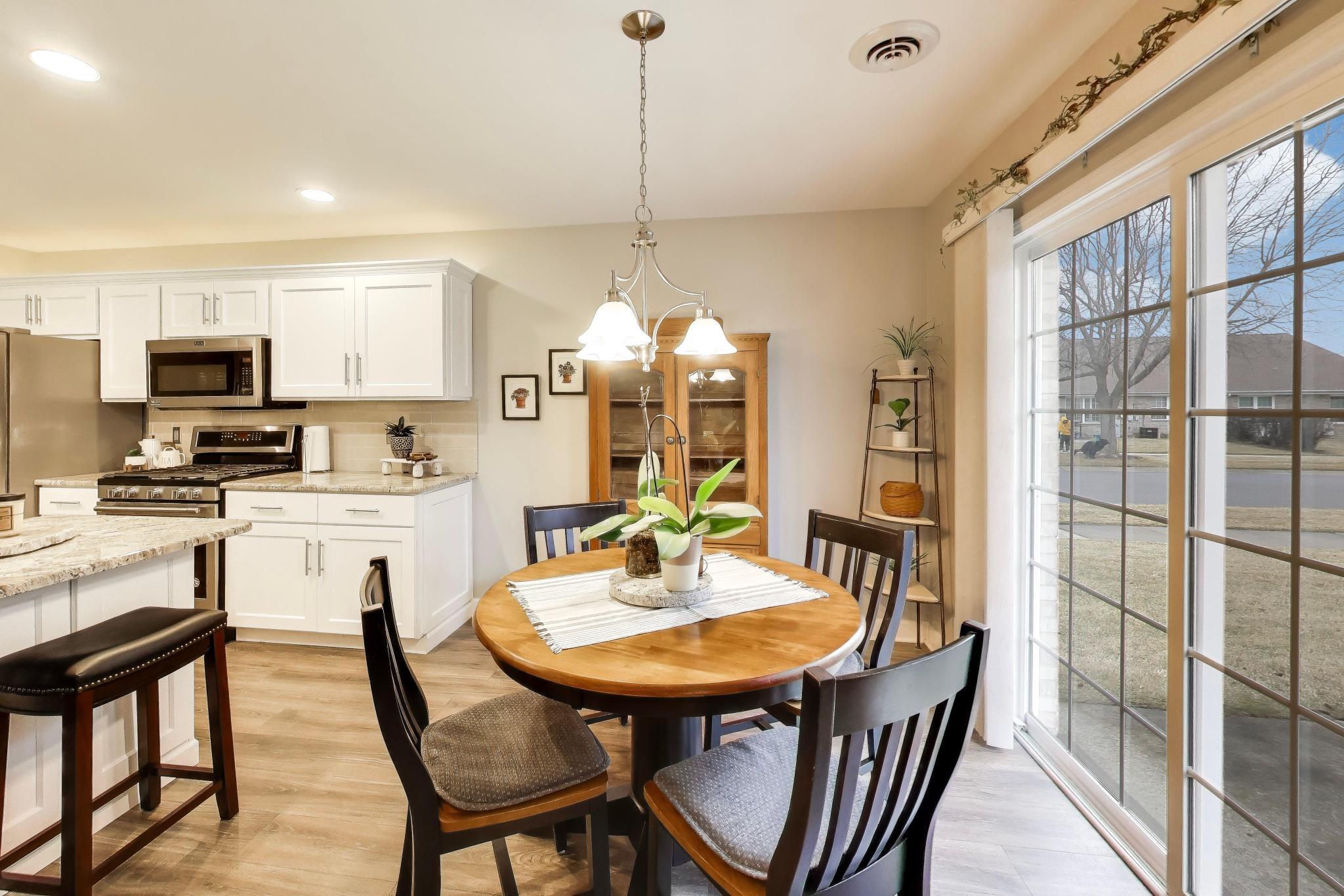 900 A Easy Street Crown Point, IN 46307 - Photo 12 of 22 a view of a dining room with furniture window and outside view