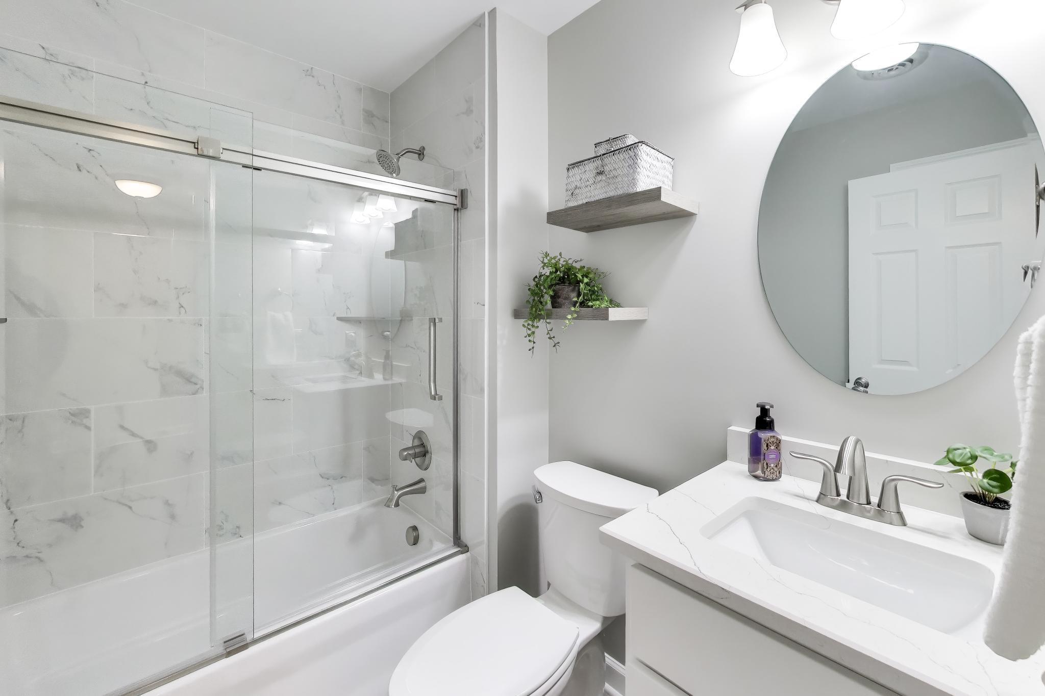 900 A Easy Street Crown Point, IN 46307 - Photo 20 of 22 a bathroom with a sink toilet and shower