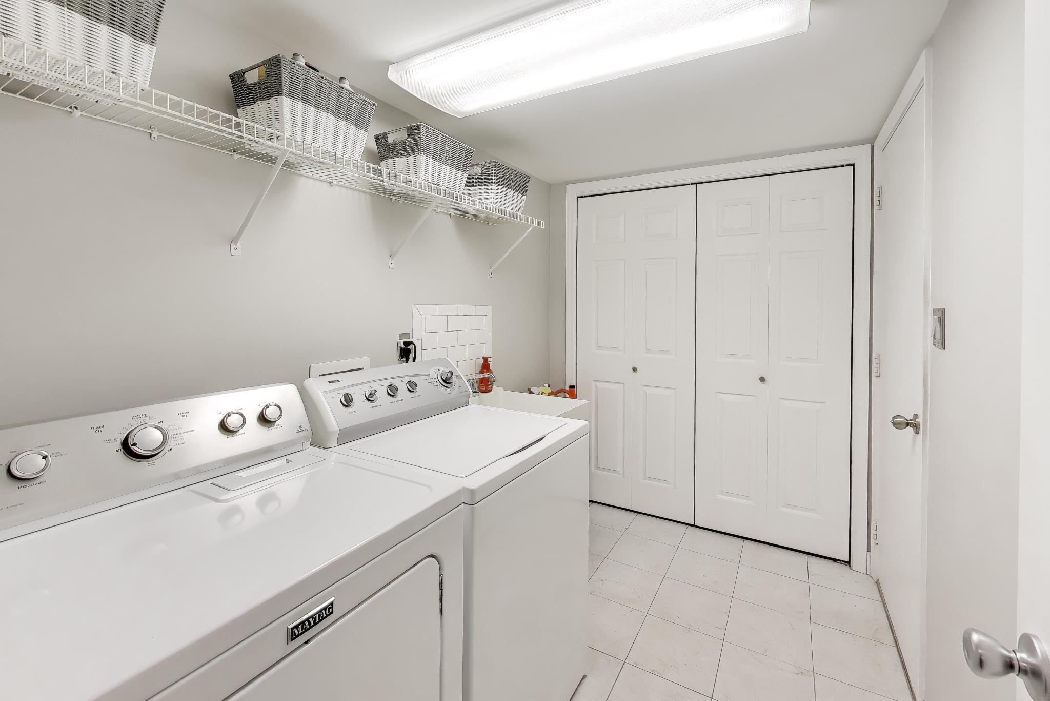 900 A Easy Street Crown Point, IN 46307 - Photo 21 of 22 a utility room with dryer and washer