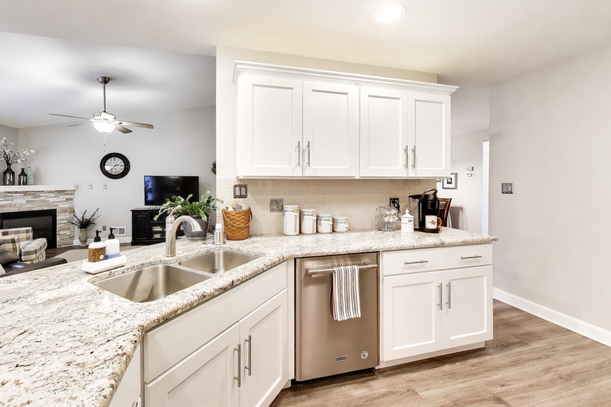 900 A Easy Street Crown Point, IN 46307 - Photo 9 of 22 a kitchen with cabinets a sink and appliances