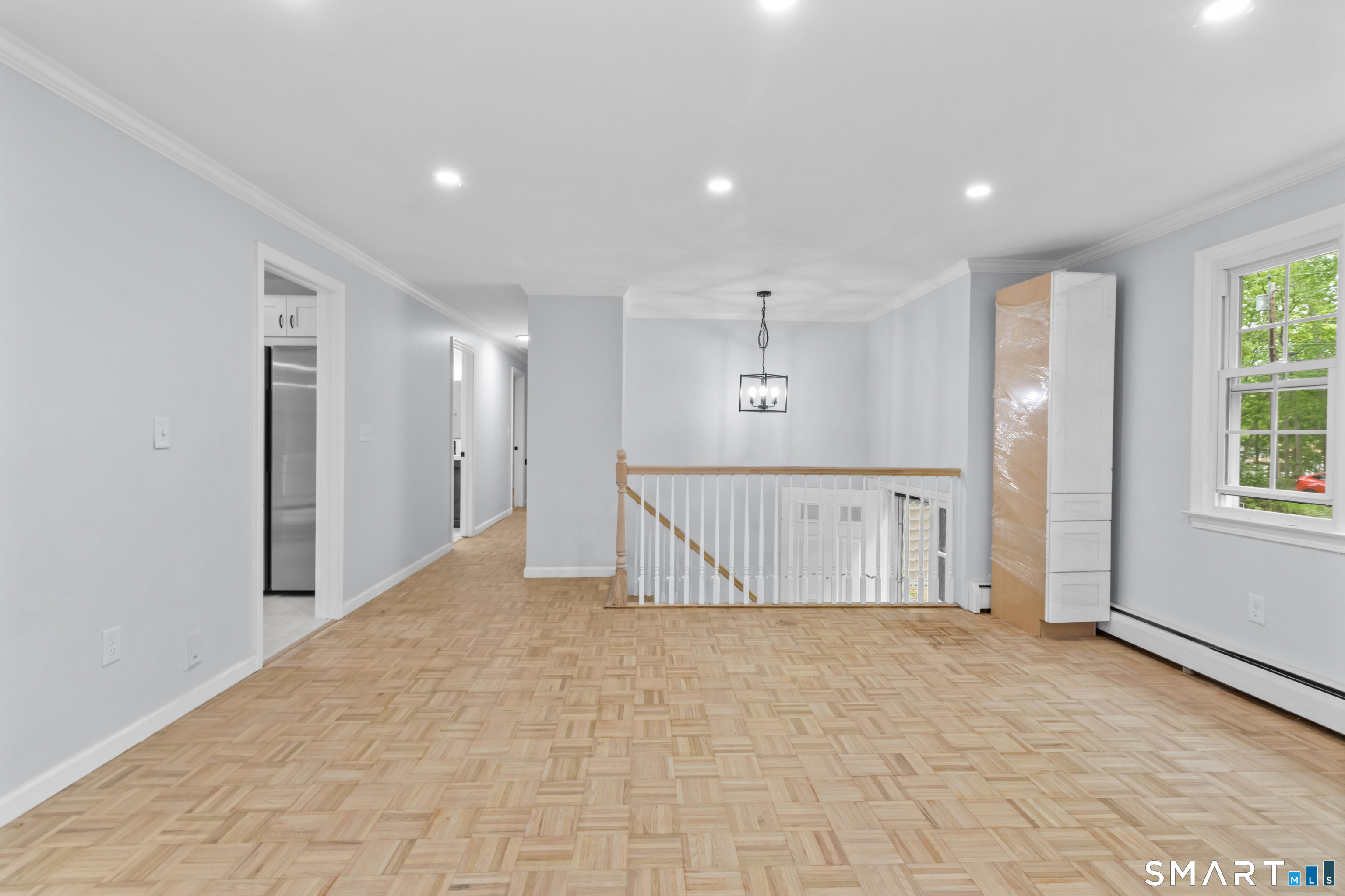 20 Quiet Woods Road East Hampton, CT 06424 - Photo 7 of 40 a view of livingroom with hardwood