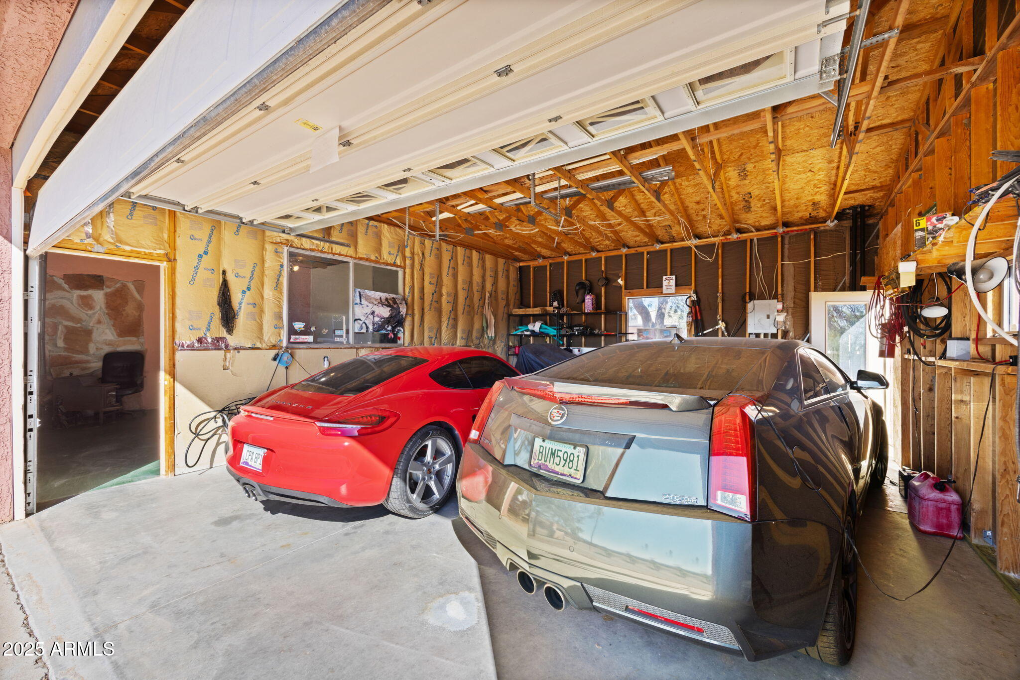 42210 North Castle Hot Springs Road Morristown, AZ 85342 - Photo 36 of 47 a car parked in front of a building
