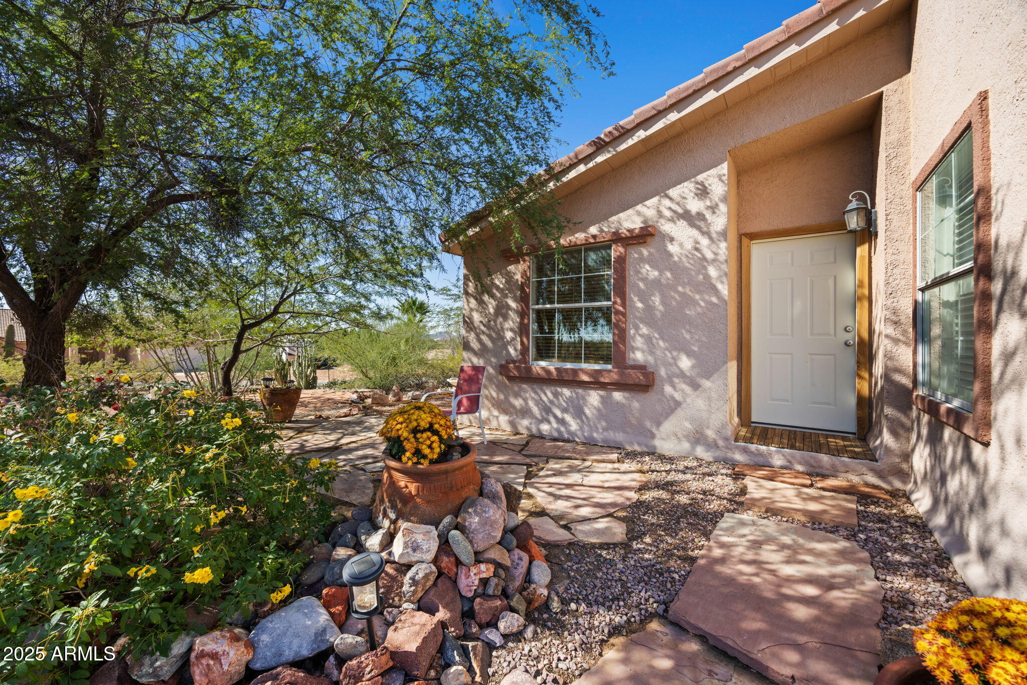 42210 North Castle Hot Springs Road Morristown, AZ 85342 - Photo 4 of 47 a backyard of a house with outdoor seating