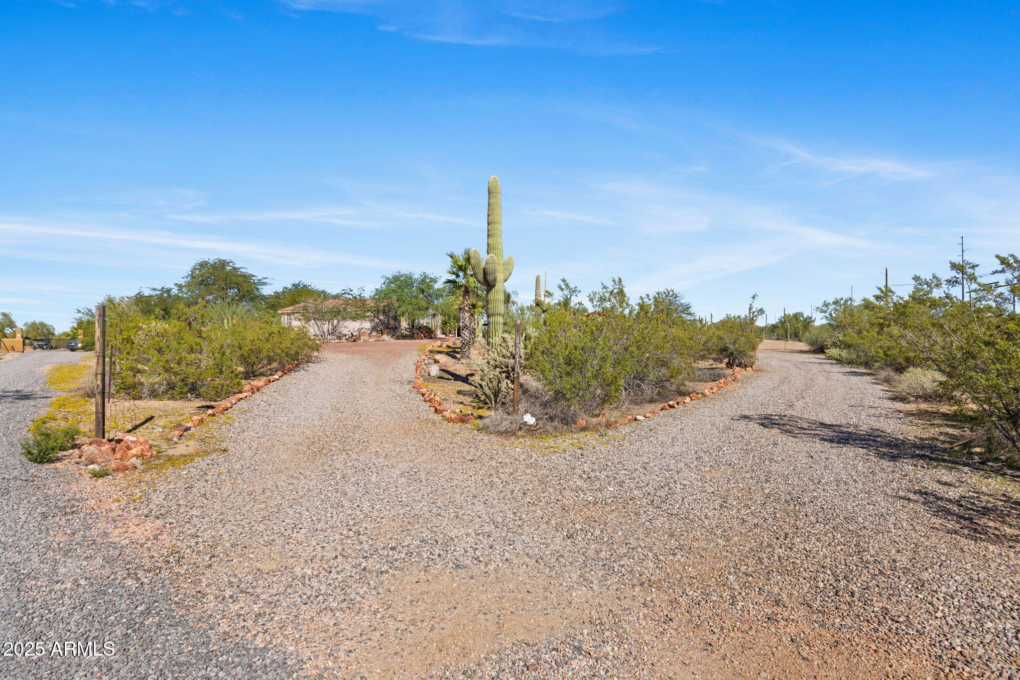 42210 North Castle Hot Springs Road Morristown, AZ 85342 - Photo 41 of 47 a view of a road with plants and trees