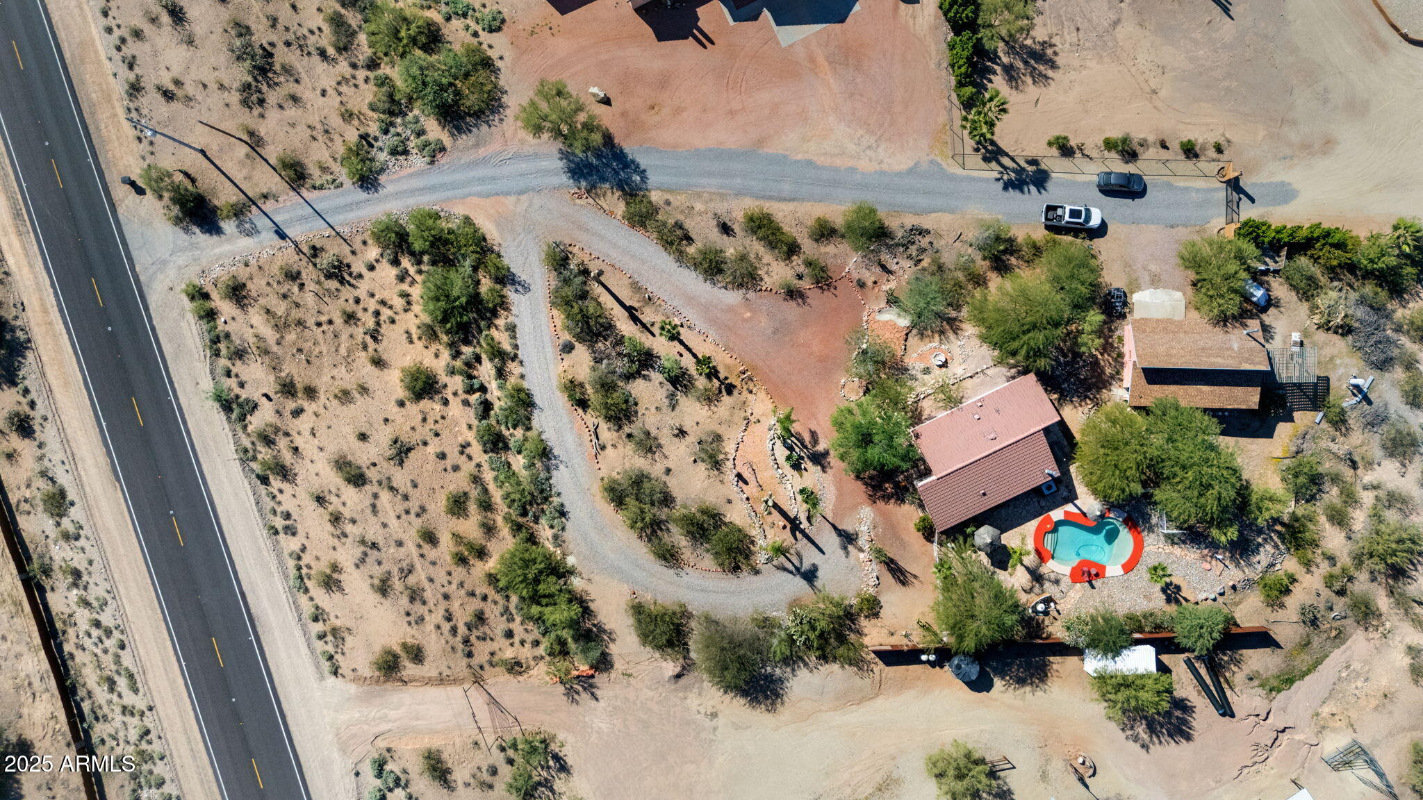 42210 North Castle Hot Springs Road Morristown, AZ 85342 - Photo 47 of 47 an aerial view of a house with a yard