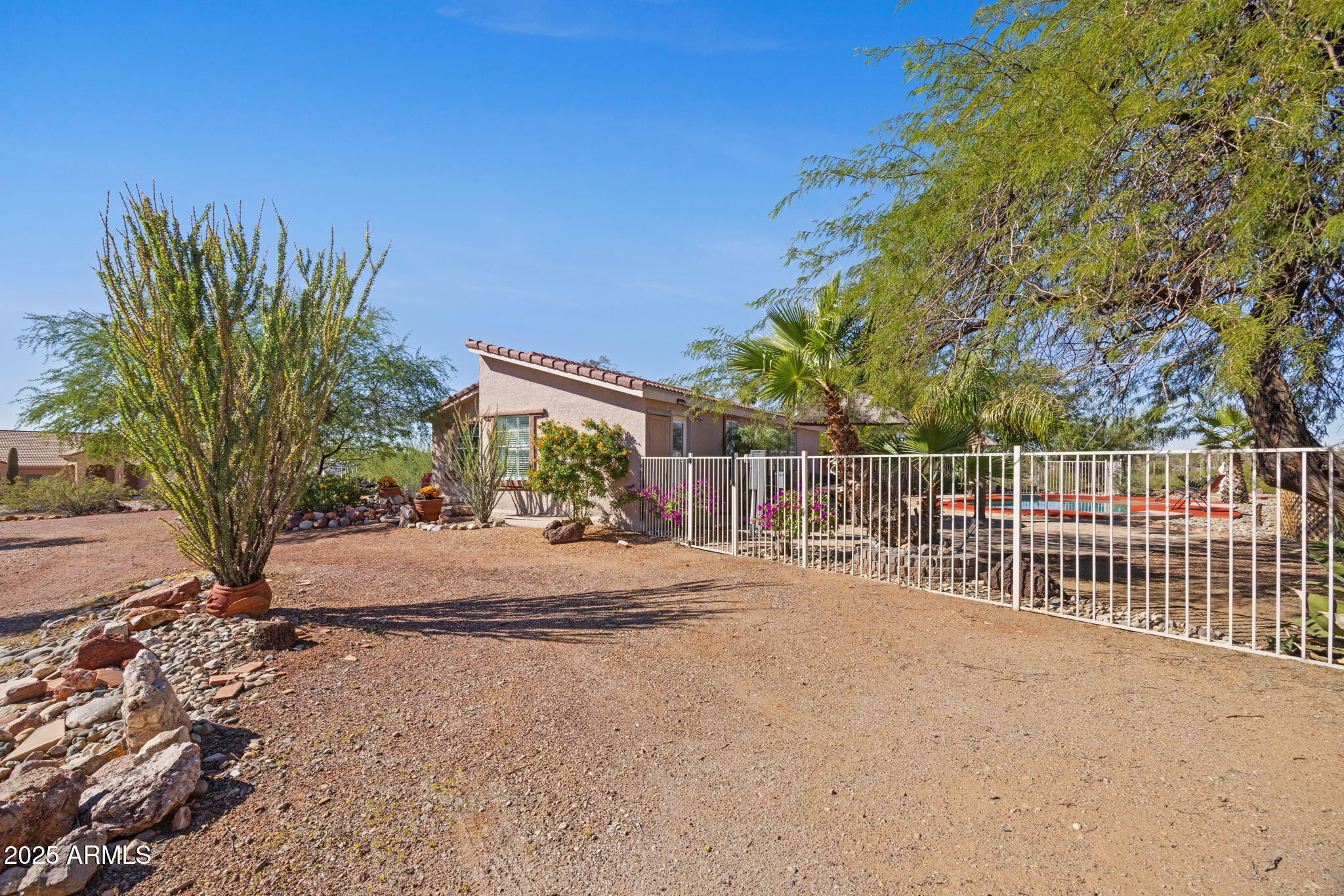 42210 North Castle Hot Springs Road Morristown, AZ 85342 - Photo 5 of 47 a view of backyard and trees