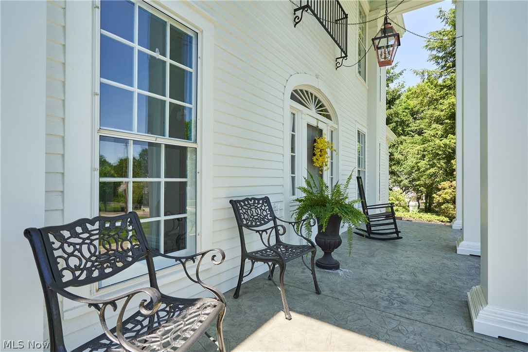 874 Merriman Road Akron, OH 44303 - Photo 5 of 50 Spend summer evenings overlooking Merriman Road from this dramatic front porch