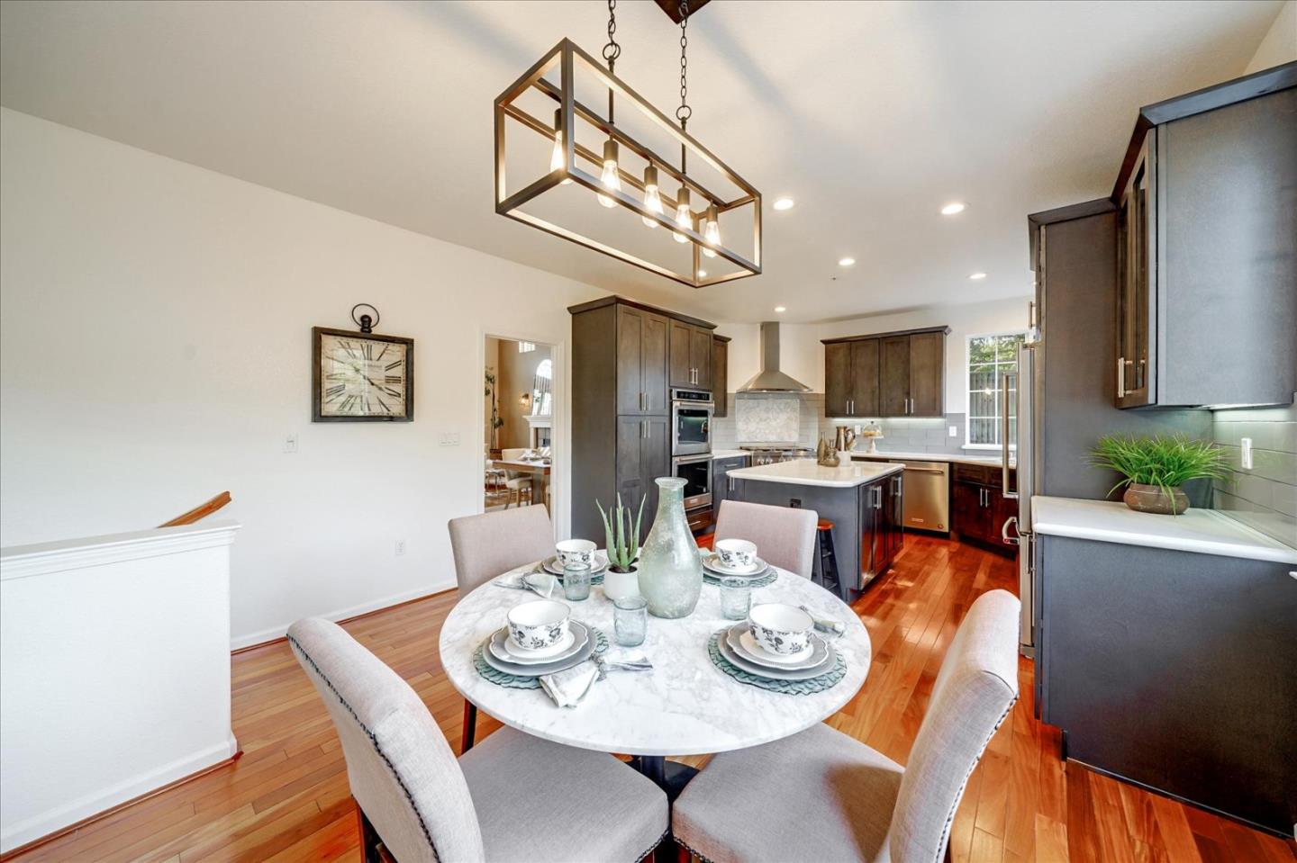 93 Ralston Ranch Road Belmont, CA 94002 - Photo 16 of 49 a view of a dining room with furniture and wooden floor
