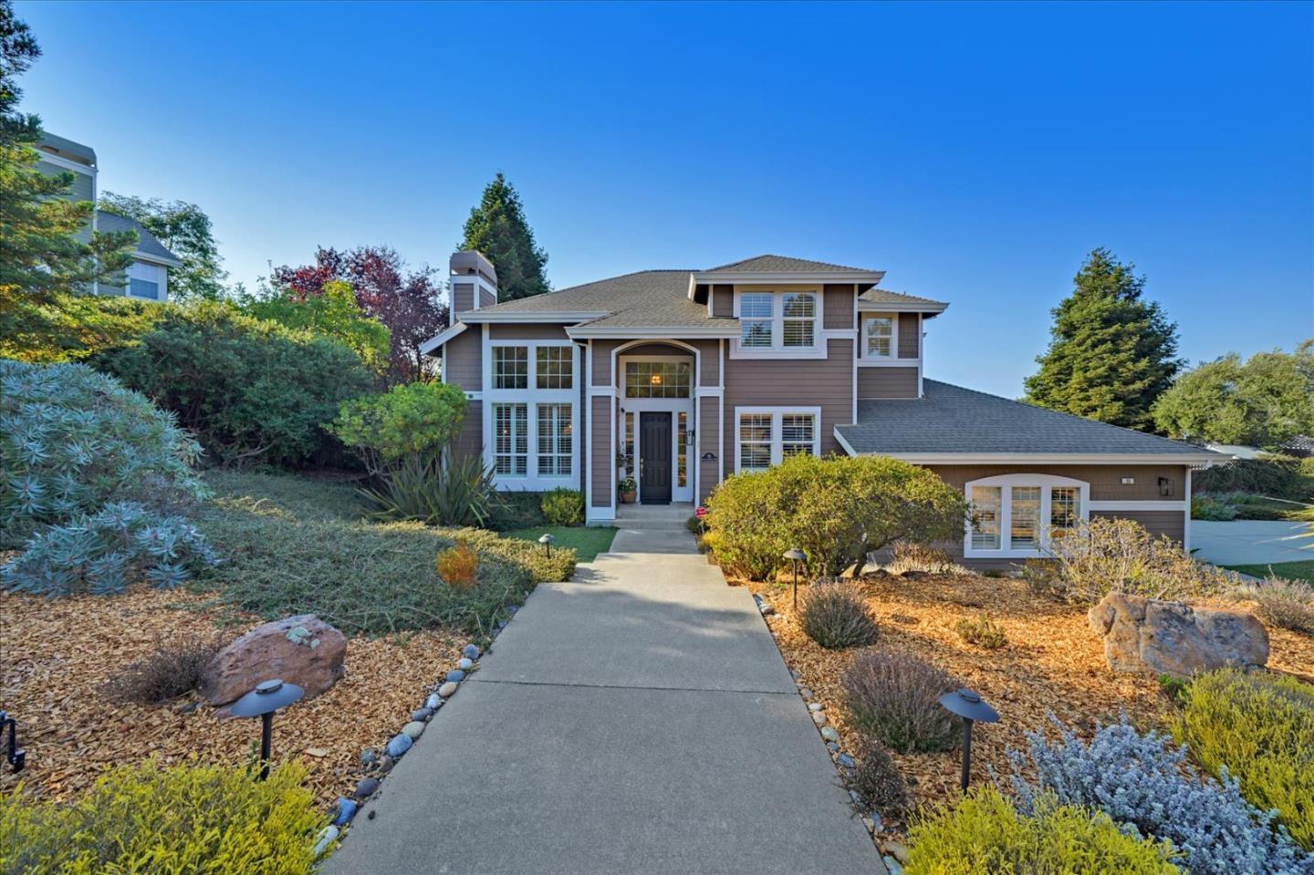 93 Ralston Ranch Road Belmont, CA 94002 - Photo 2 of 49 a front view of a house with a yard