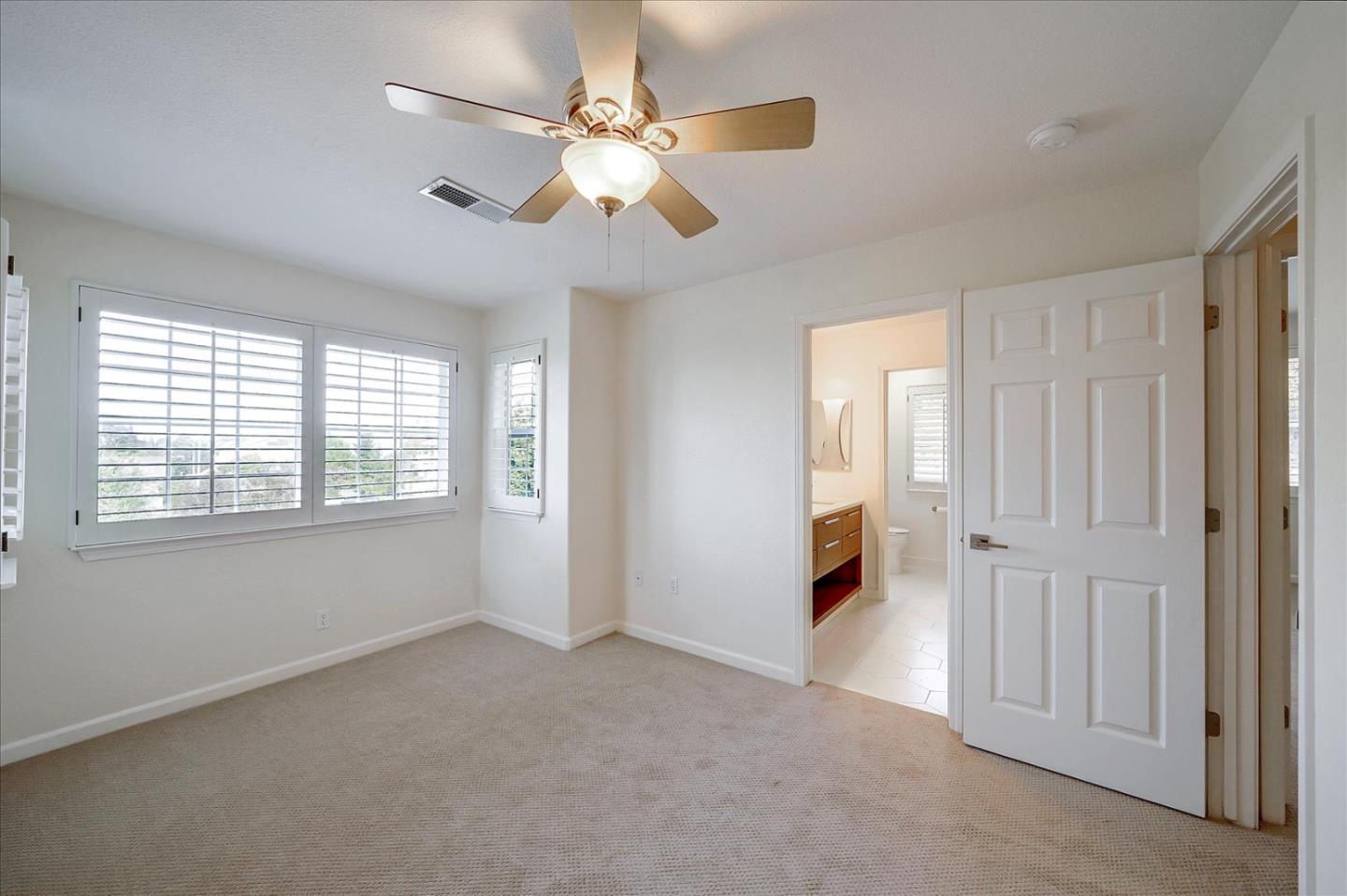 93 Ralston Ranch Road Belmont, CA 94002 - Photo 22 of 49 a view of a livingroom with a ceiling fan and window