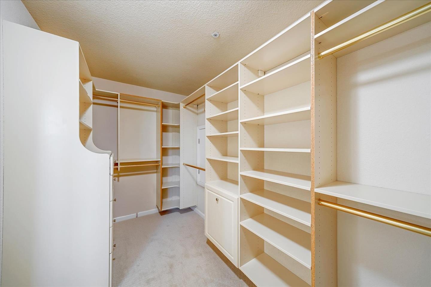 93 Ralston Ranch Road Belmont, CA 94002 - Photo 24 of 49 a view of walk in closet with empty racks