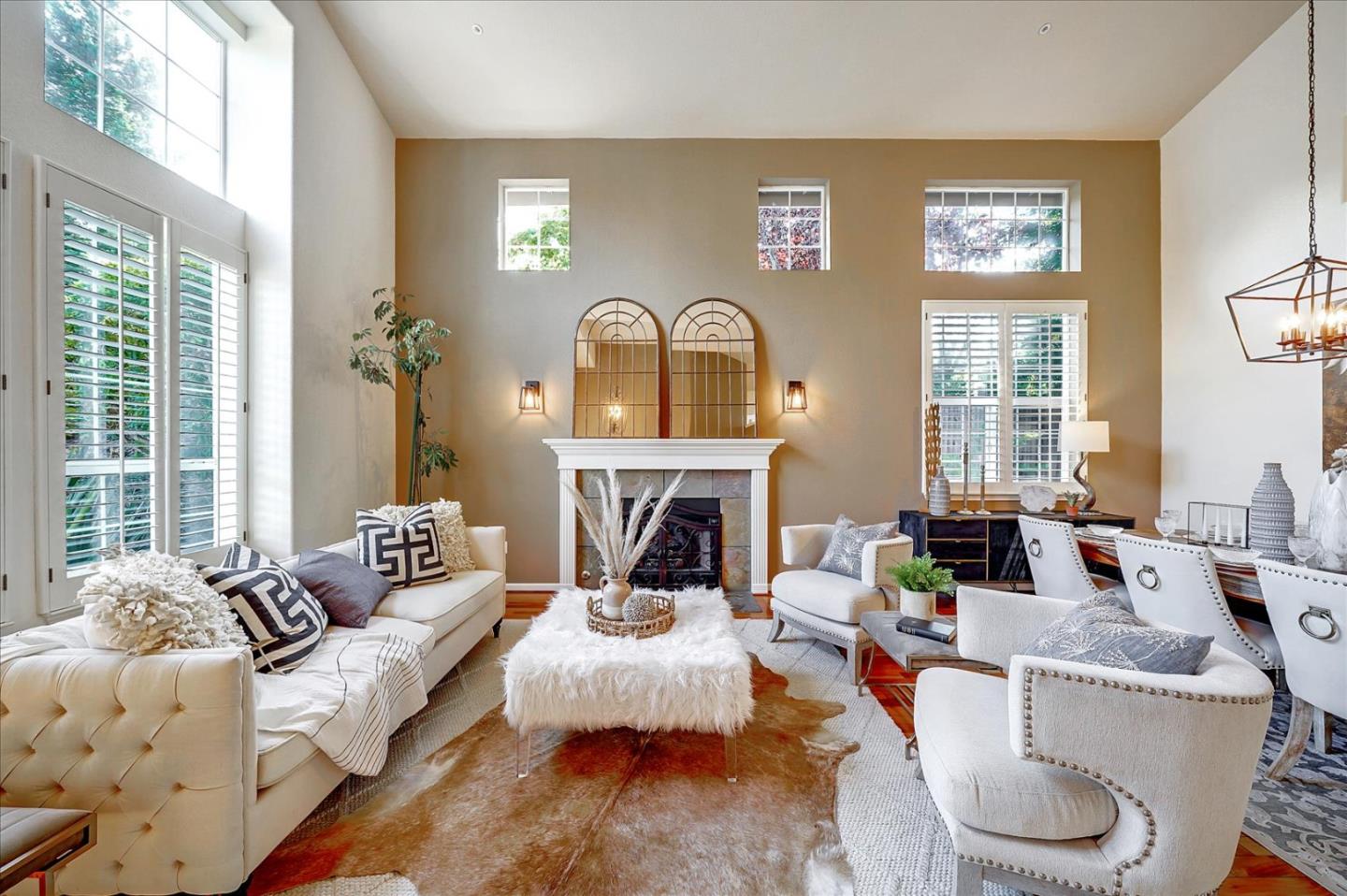 93 Ralston Ranch Road Belmont, CA 94002 - Photo 6 of 49 a living room with furniture a fireplace and a large window