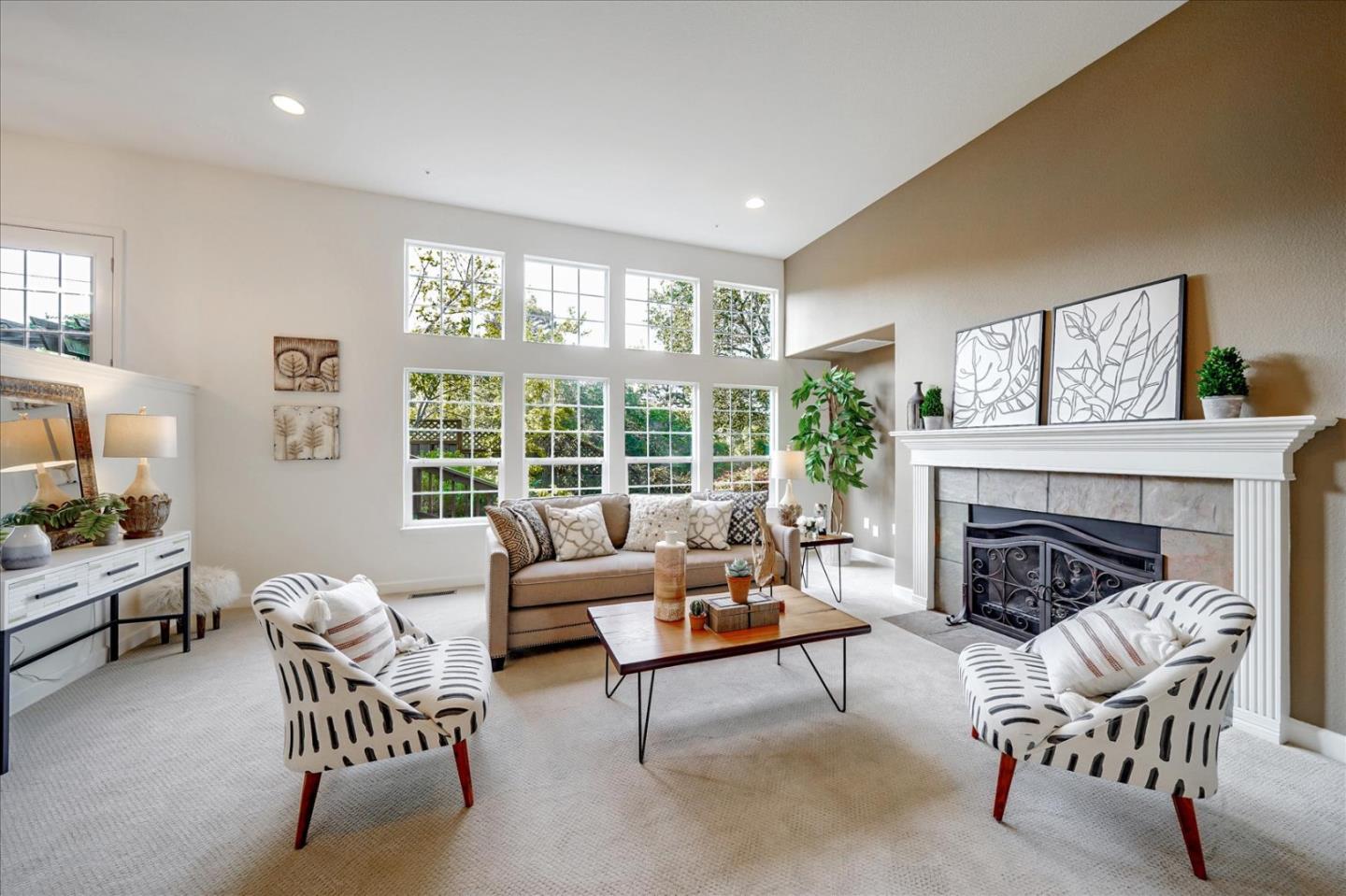 93 Ralston Ranch Road Belmont, CA 94002 - Photo 7 of 49 a living room with furniture and a fireplace