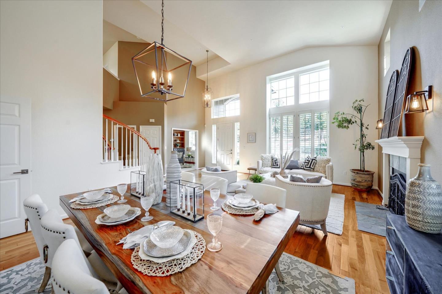 93 Ralston Ranch Road Belmont, CA 94002 - Photo 9 of 49 a dining room with furniture a large window and a table