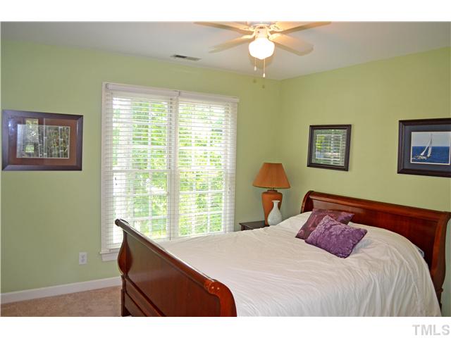 149 Chimney Rise Drive Cary, NC 27511 - Photo 16 of 24 a bedroom with a bed and a window