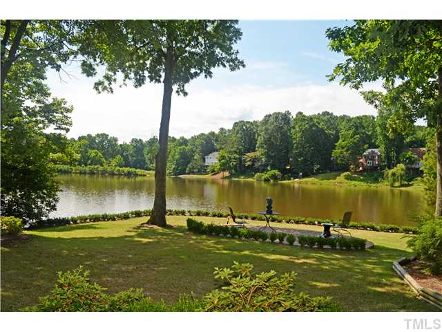 149 Chimney Rise Drive Cary, NC 27511 - Photo 2 of 24 a view of a lake from a yard