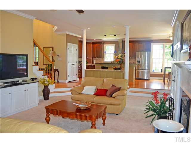 149 Chimney Rise Drive Cary, NC 27511 - Photo 6 of 24 a living room with furniture and a flat screen tv