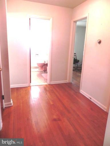 1901 Elton Road Adelphi, MD 20783 - Photo 15 of 27 Hallway to LR DR BRS Bath spa- ious LINEN CLOSET