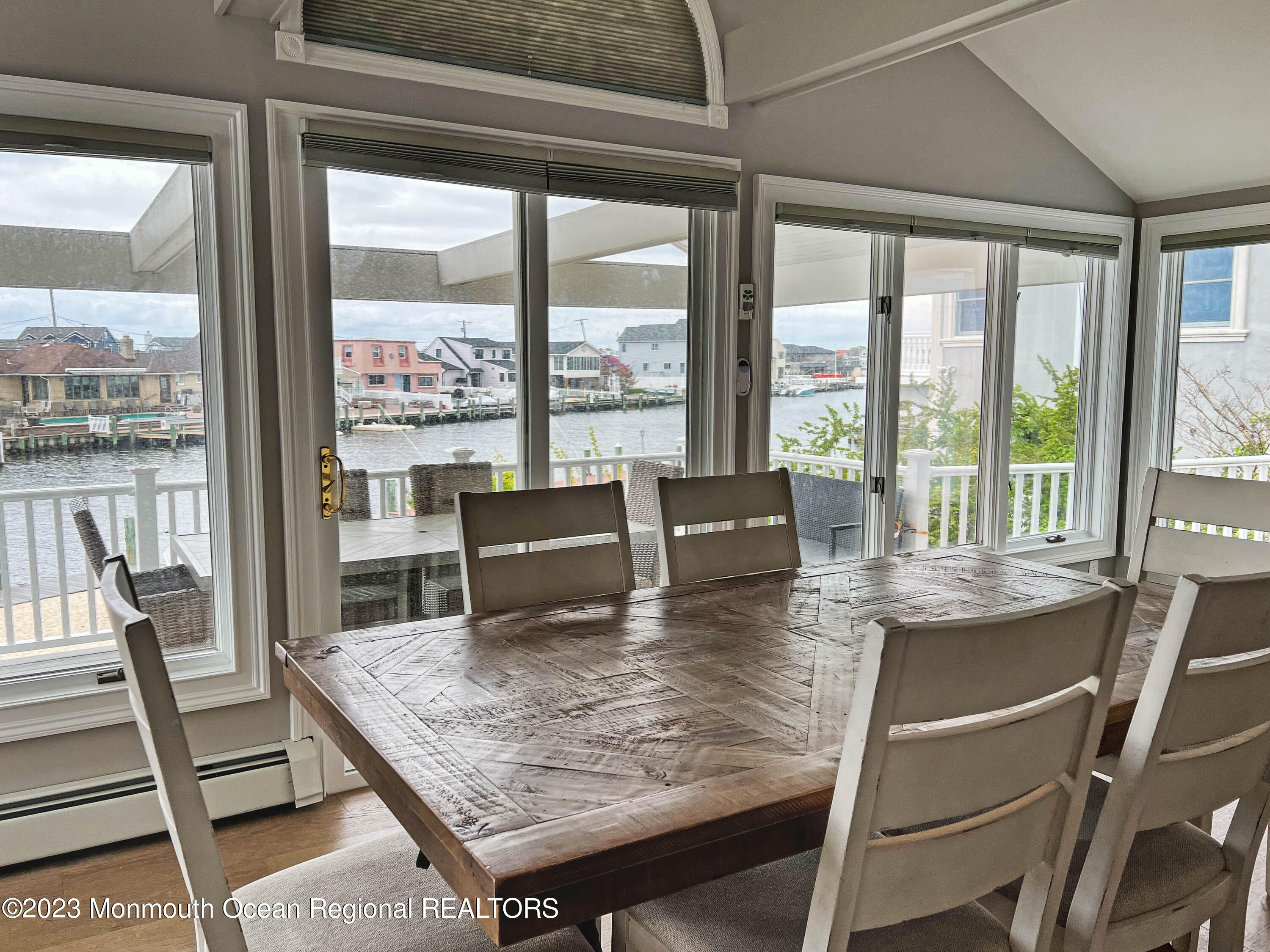 43 Woodhaven Road Toms River, NJ 08753 - Photo 22 of 67 a dining room with furniture and wooden floor