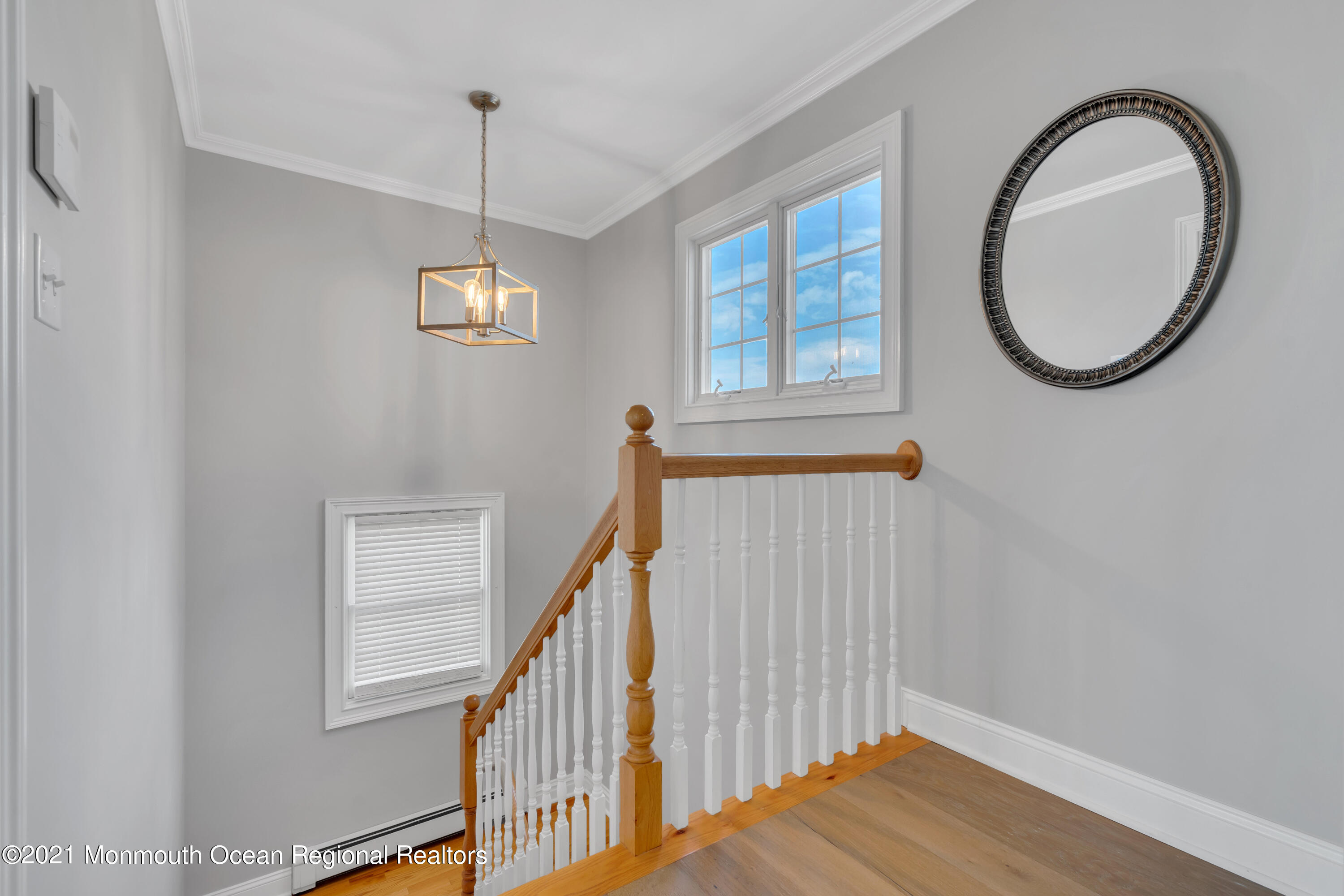 43 Woodhaven Road Toms River, NJ 08753 - Photo 30 of 67 a view of a hallway with wooden floor and staircase