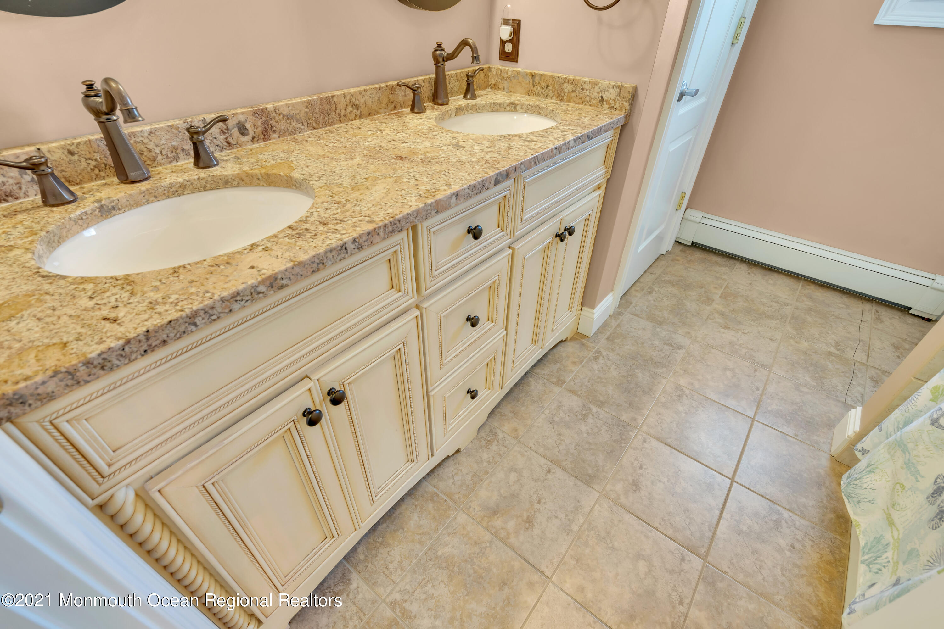 43 Woodhaven Road Toms River, NJ 08753 - Photo 36 of 67 a bathroom with a granite countertop sink and a mirror