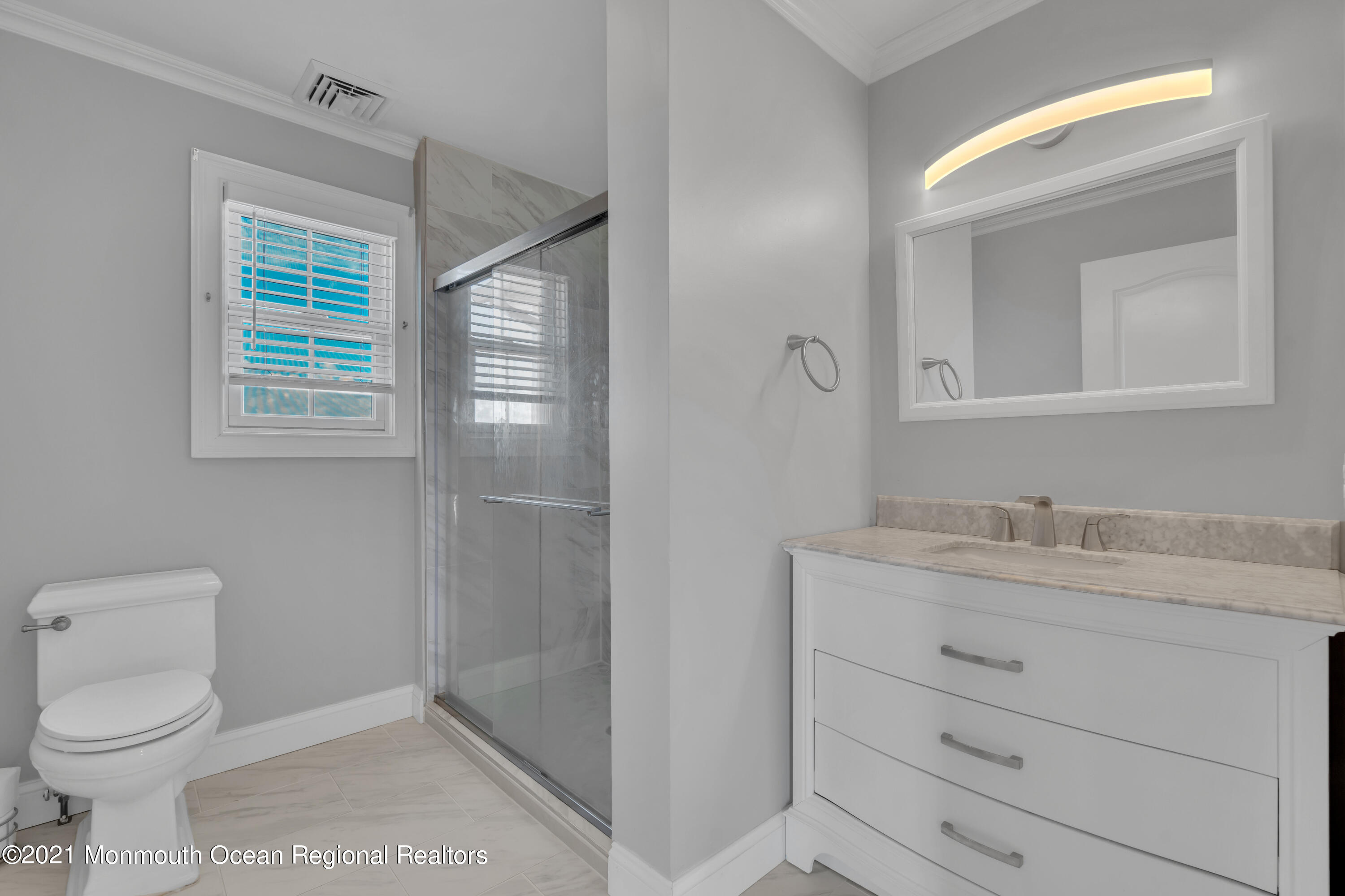 43 Woodhaven Road Toms River, NJ 08753 - Photo 40 of 67 a bathroom with a granite countertop toilet sink and mirror