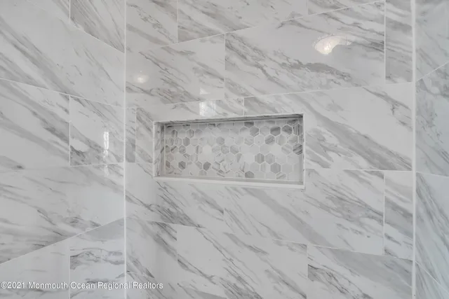 a view of a deck with table and chairs wooden floor and fence