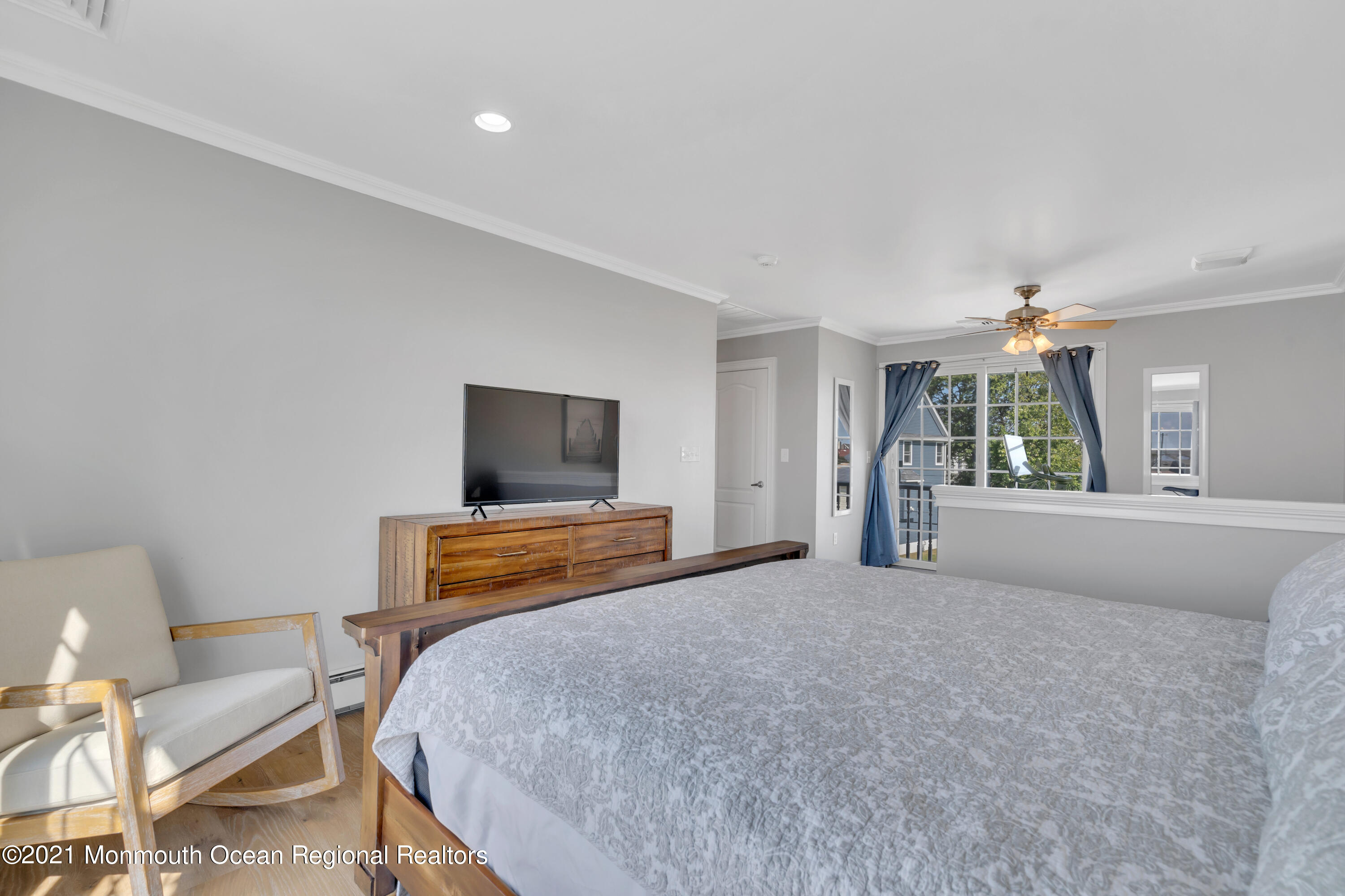 43 Woodhaven Road Toms River, NJ 08753 - Photo 44 of 67 a bedroom with a bed and a flat screen tv