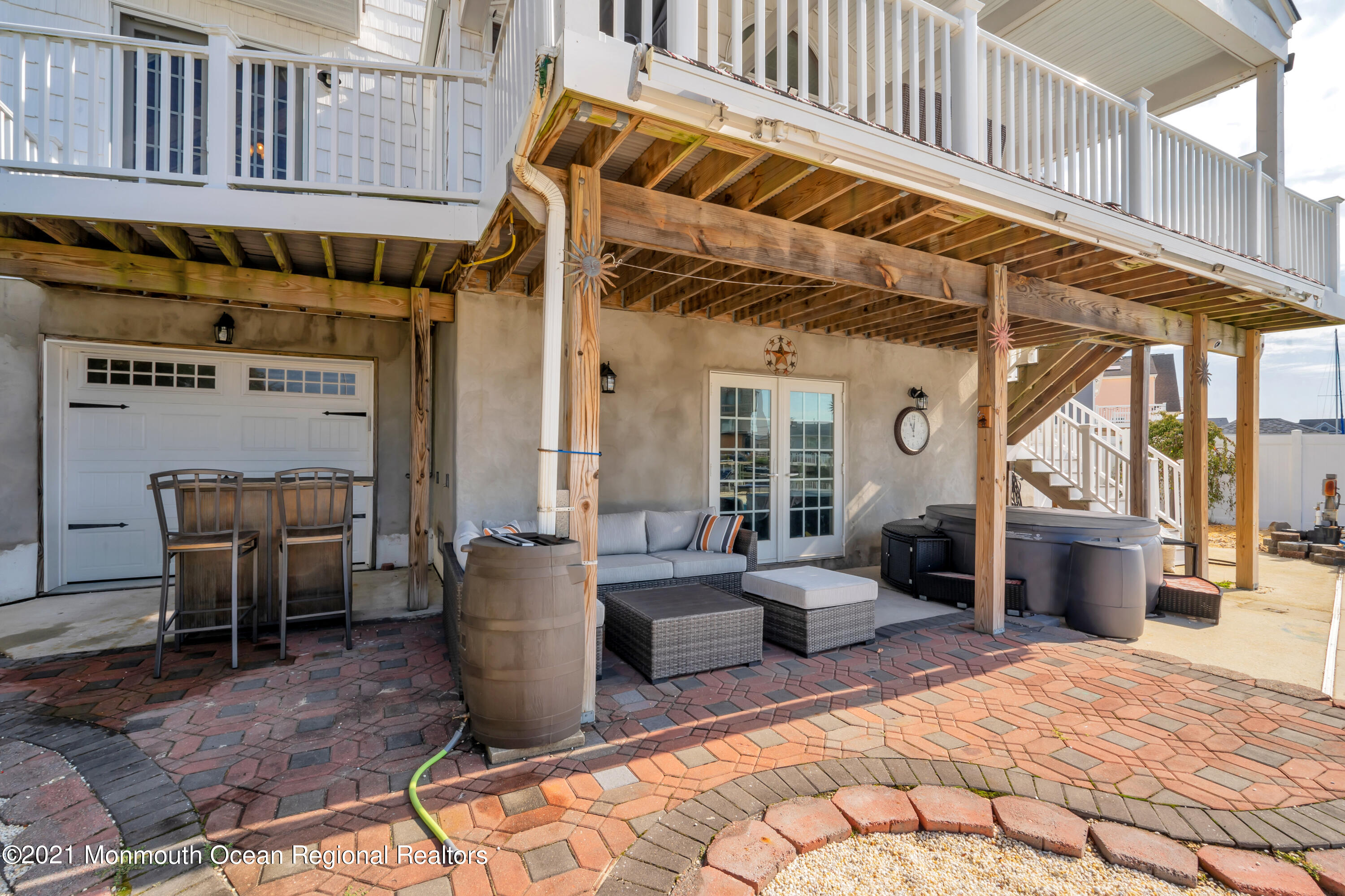 43 Woodhaven Road Toms River, NJ 08753 - Photo 45 of 67 a view of a patio with table and chairs
