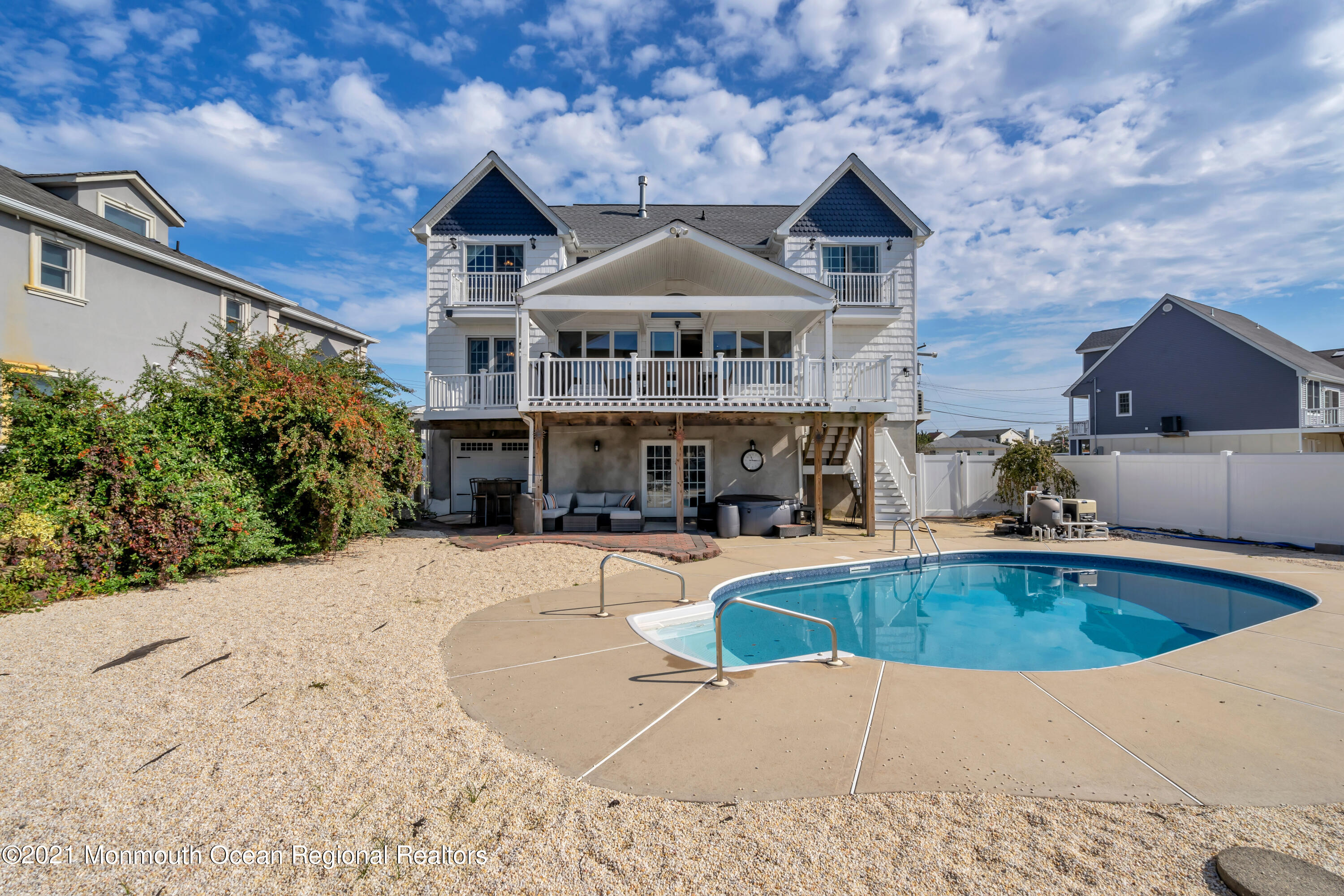 43 Woodhaven Road Toms River, NJ 08753 - Photo 60 of 67 a view of a house with swimming pool and sitting area