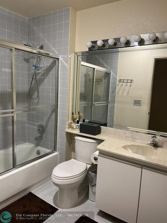 7876 La Mirada Drive Boca Raton, FL 33433 - Photo 17 of 34 a bathroom with a sink toilet and shower