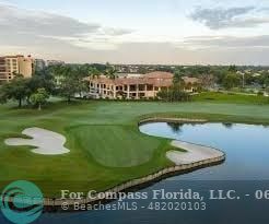 7876 La Mirada Drive Boca Raton, FL 33433 - Photo 22 of 34 a view of a golf course with a lake