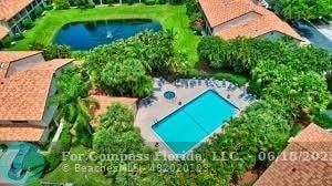 7876 La Mirada Drive Boca Raton, FL 33433 - Photo 31 of 34 an aerial view of a house with a yard