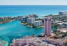7876 La Mirada Drive Boca Raton, FL 33433 - Photo 34 of 34 a view of a lake with tall buildings