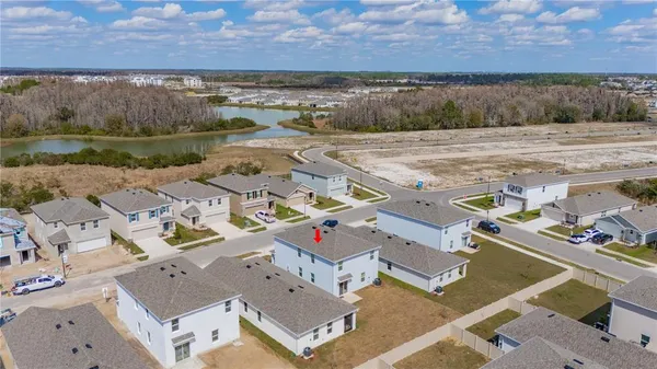 an aerial view of residential house with outdoor space