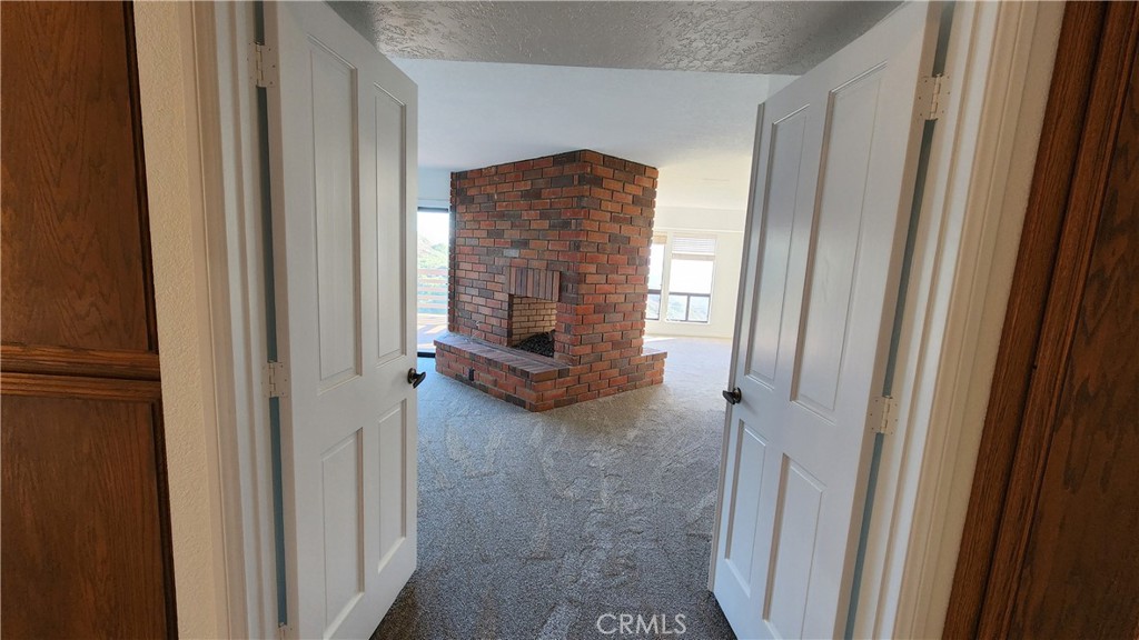 750 Avenida Acapulco San Clemente, CA 92672 - Photo 16 of 25 a view of a fireplace in a hallway