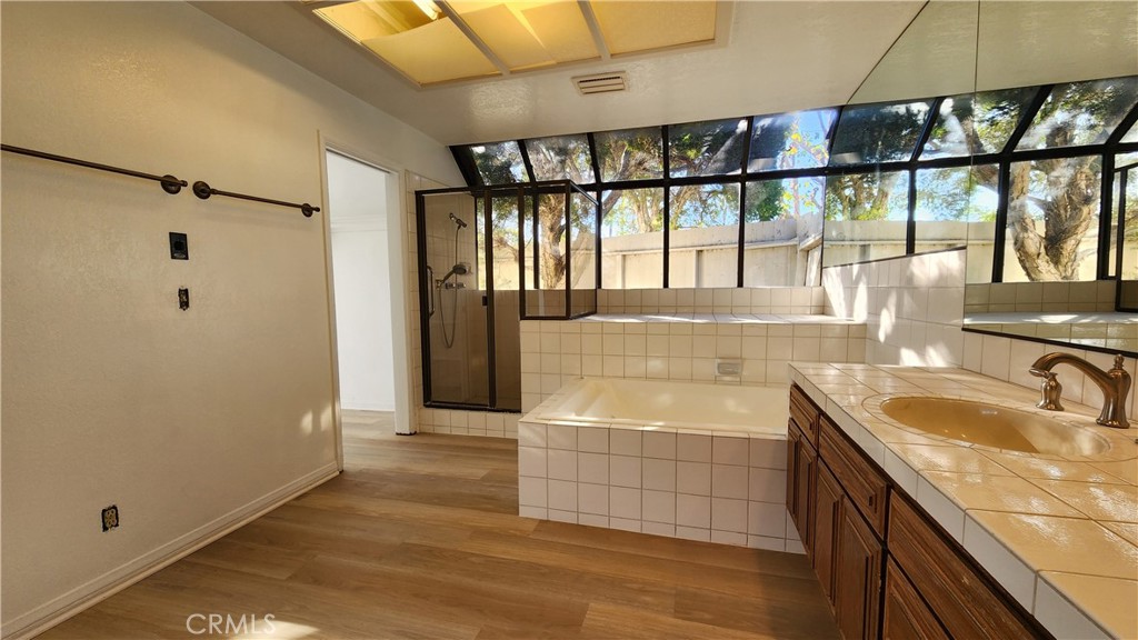 750 Avenida Acapulco San Clemente, CA 92672 - Photo 21 of 25 a bathroom with a sink and a large window