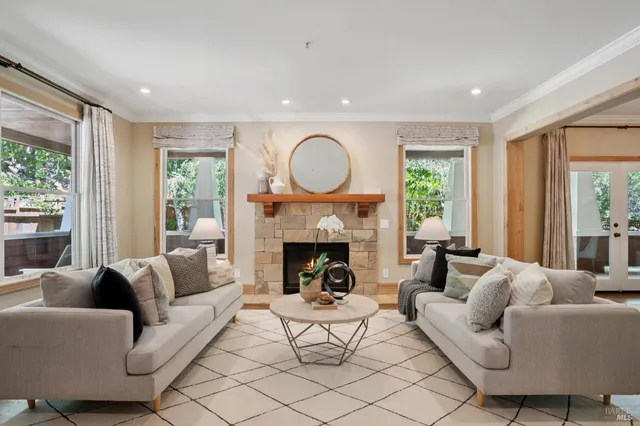 a living room with furniture and a window