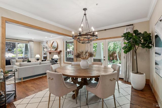 a kitchen with granite countertop stainless steel appliances and wooden cabinets