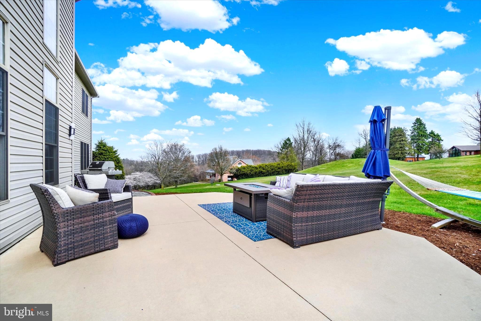 750 Rydell Drive Dallastown, PA 17313 - Photo 18 of 61 a view of a couches in the patio with a small yard