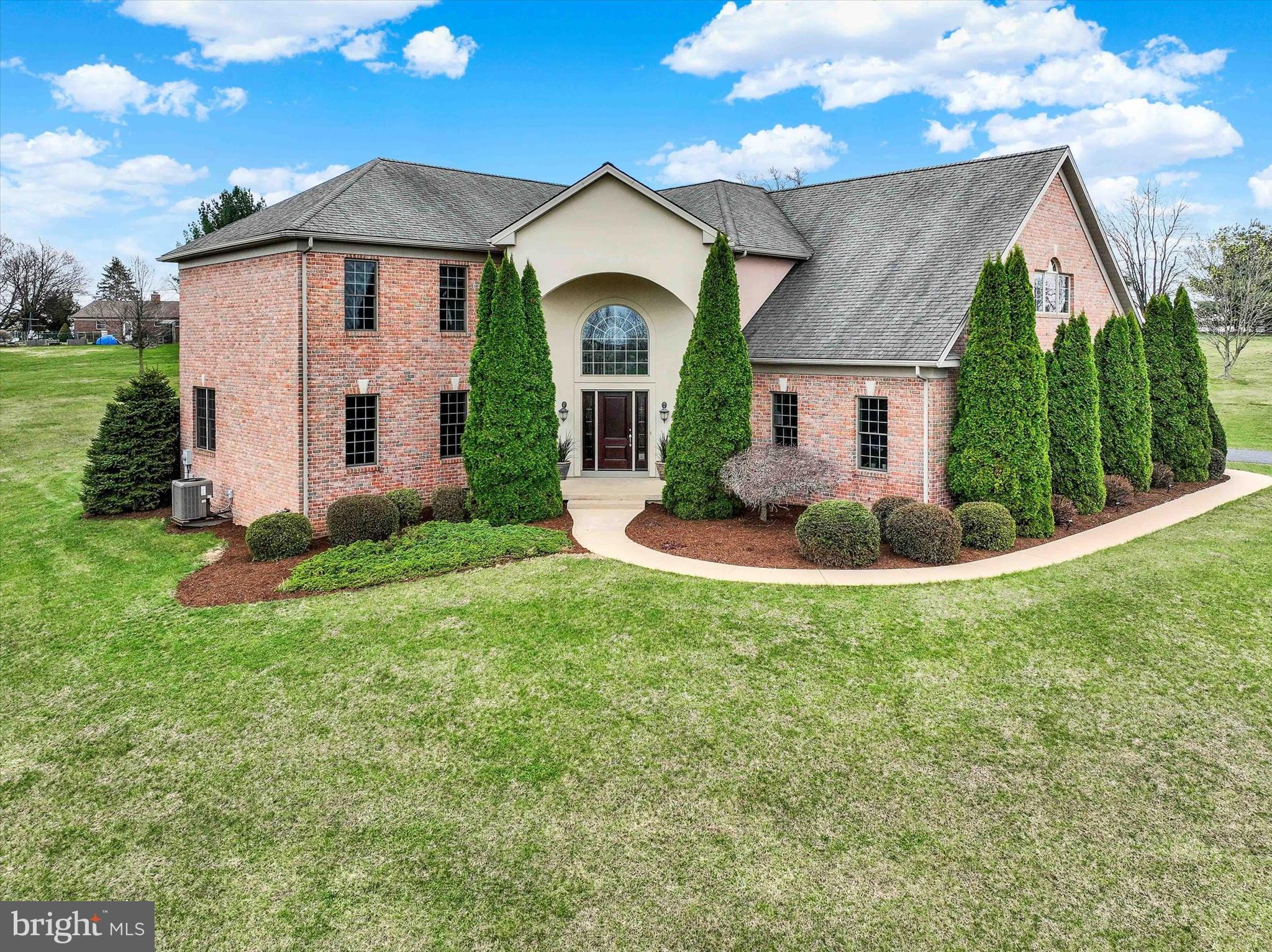 750 Rydell Drive Dallastown, PA 17313 - Photo 2 of 61 a front view of a house with garden