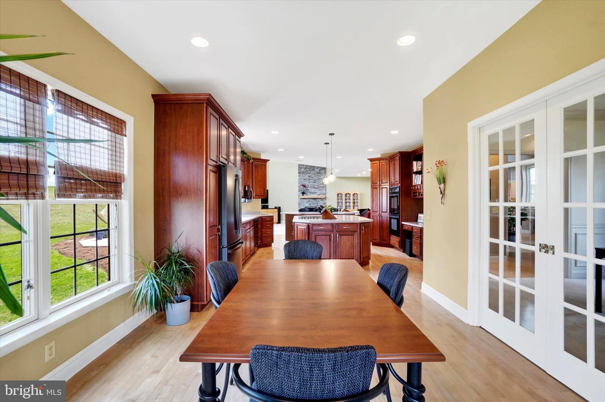 750 Rydell Drive Dallastown, PA 17313 - Photo 27 of 61 a view of a dining room with furniture window and wooden floor