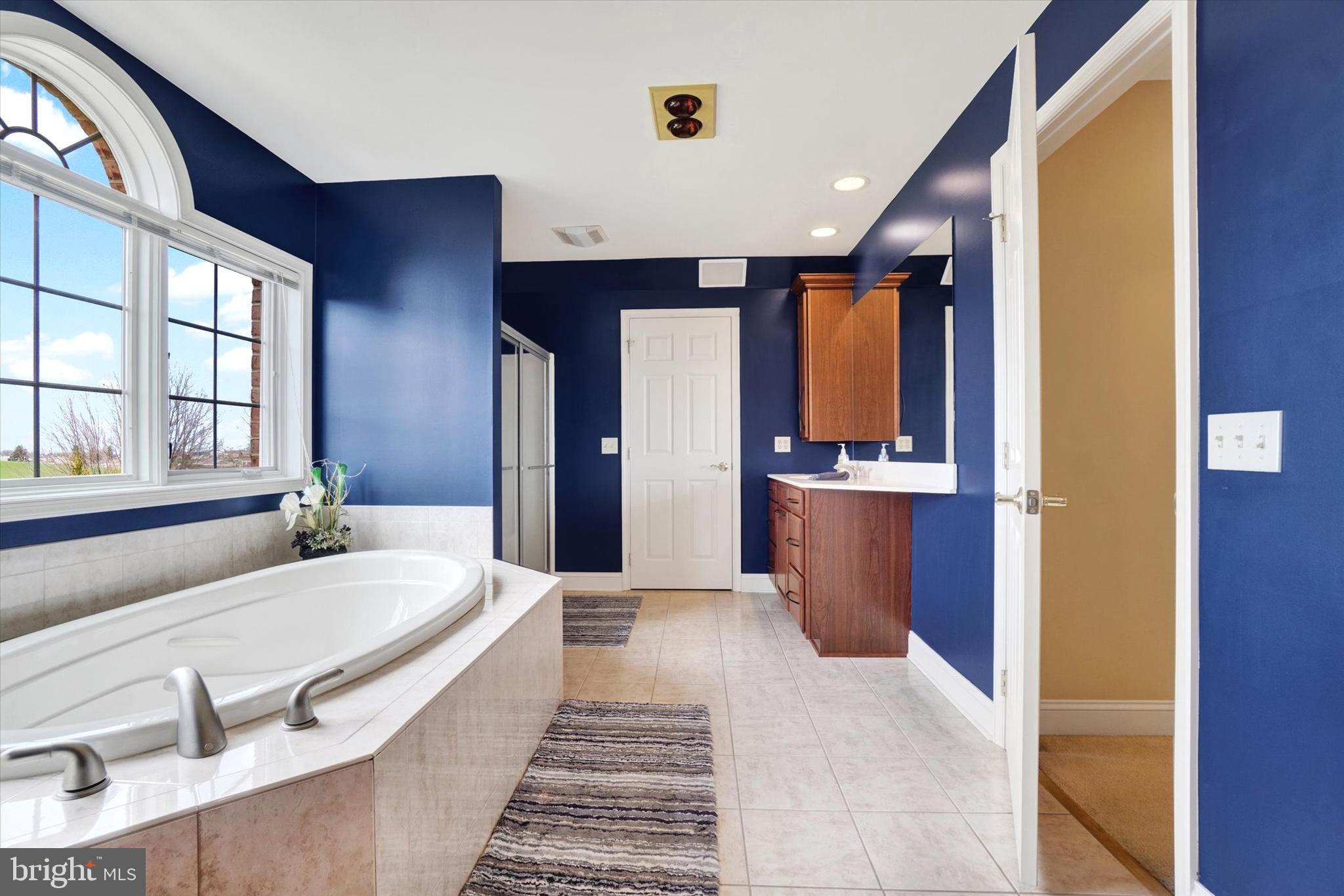 750 Rydell Drive Dallastown, PA 17313 - Photo 46 of 61 a large bedroom with a large bed and balcony