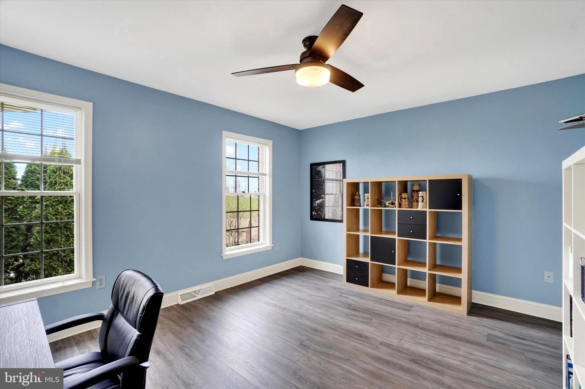 750 Rydell Drive Dallastown, PA 17313 - Photo 51 of 61 a view of an empty room with a window and wooden floor